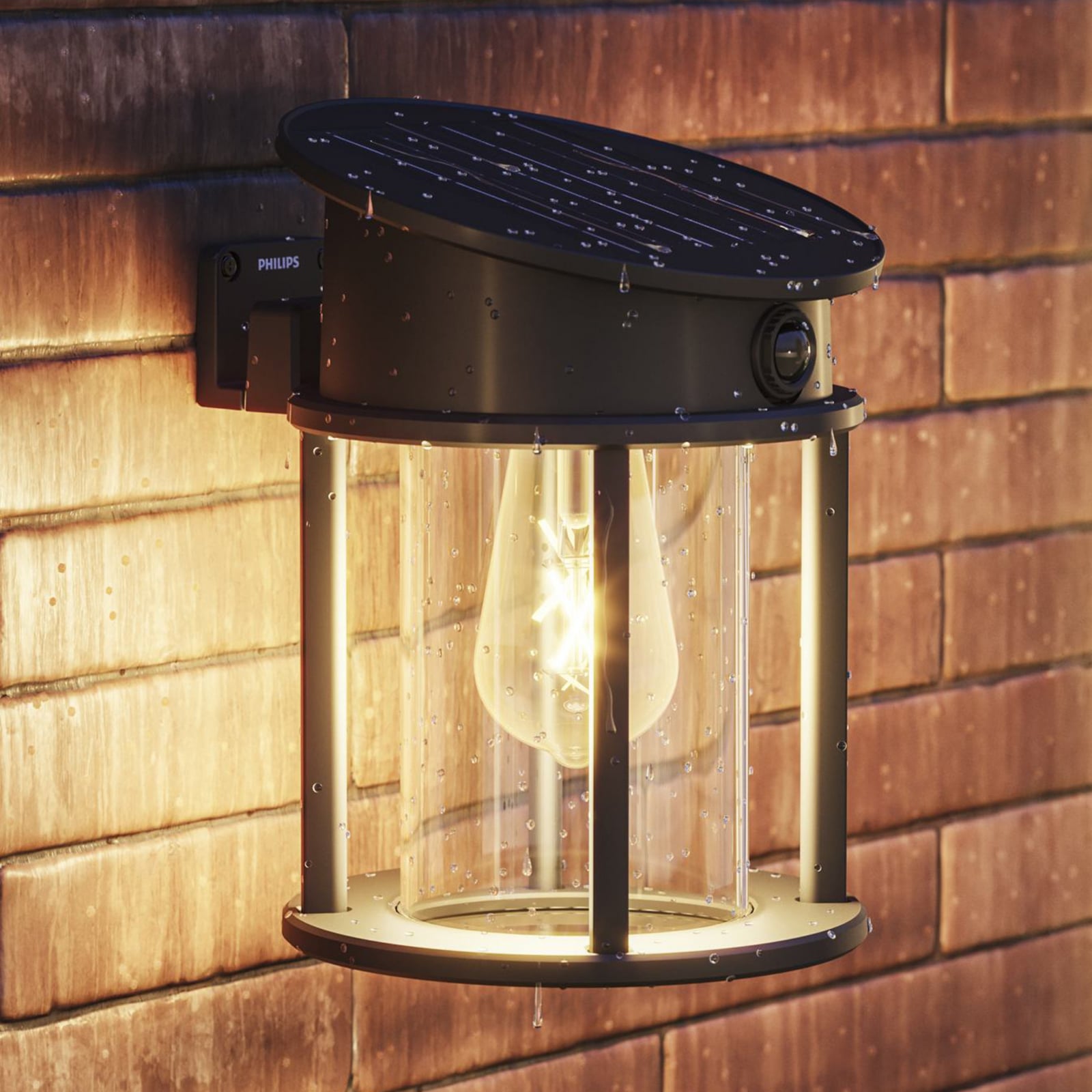 LED solcelle utevegglampe Geri rund med sensor svart IP44 - Philips forfra