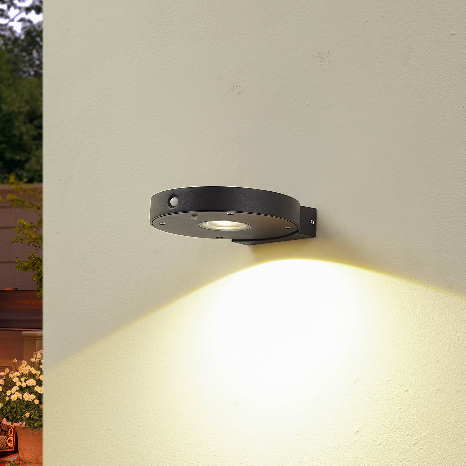 LED solcelle utevegglampe Tavon rund dimbar svart IP54 forfra