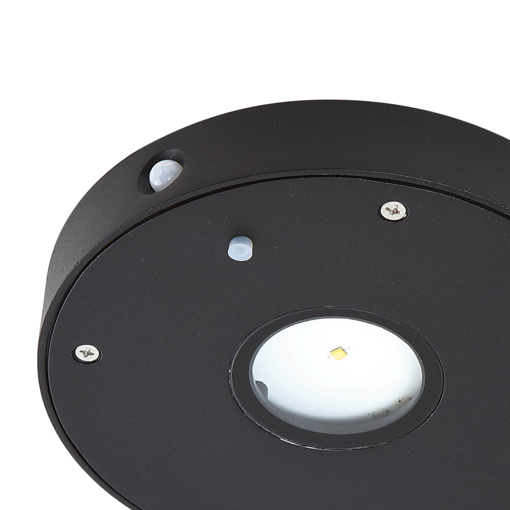 LED solcelle utevegglampe Tavon rund dimbar svart IP54 sett fra siden
