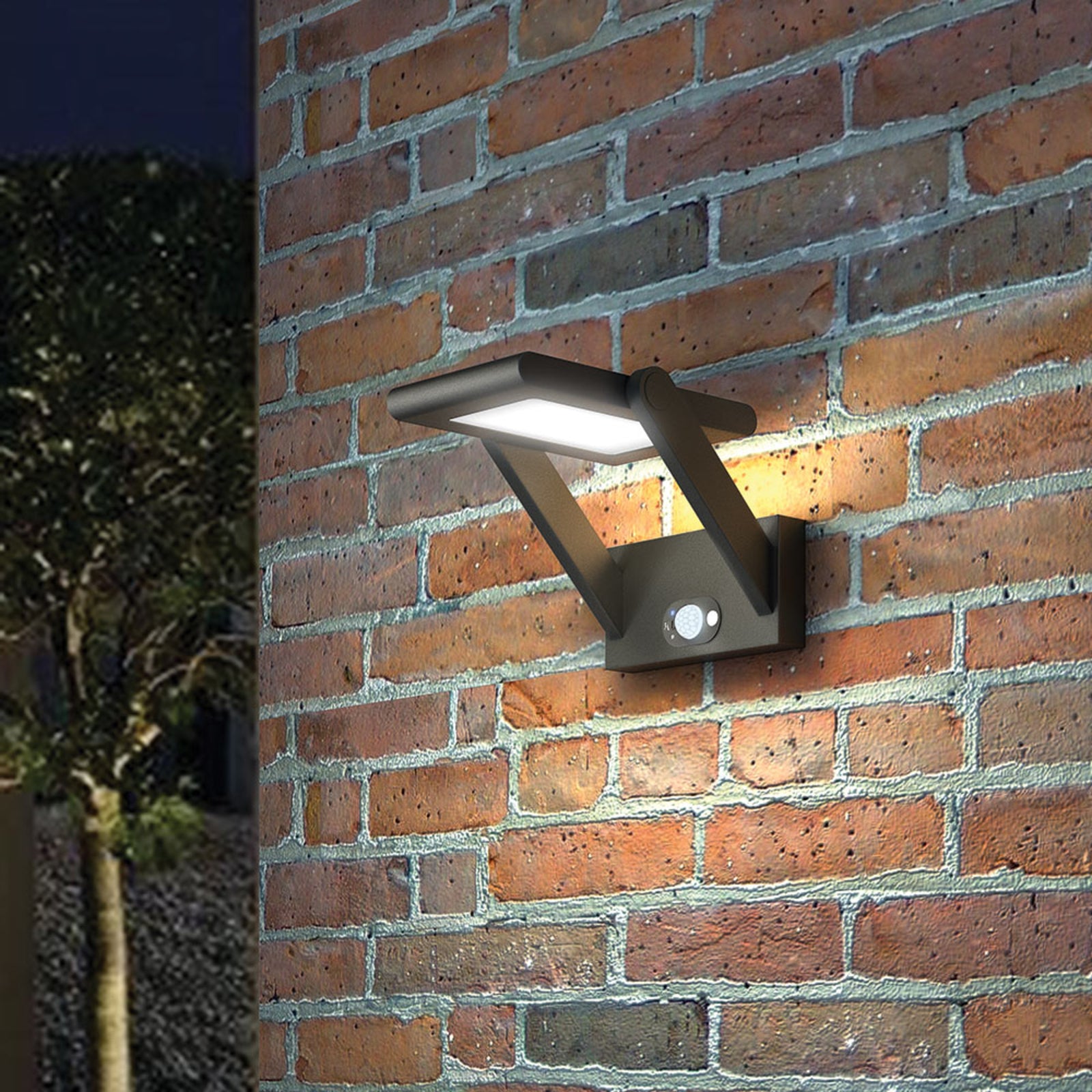 Nærbilde av solcellepanel på LED solcelle utevegglampe Valerian med bevegelsessensor IP54