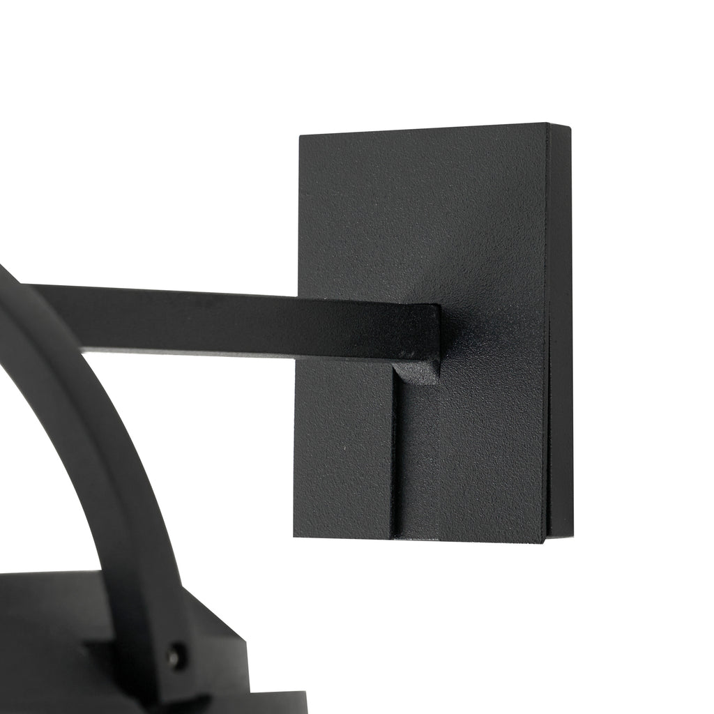 LED solcelle-vegglampe Tilena rund dimbar svart IP54 brukt som bordlampe