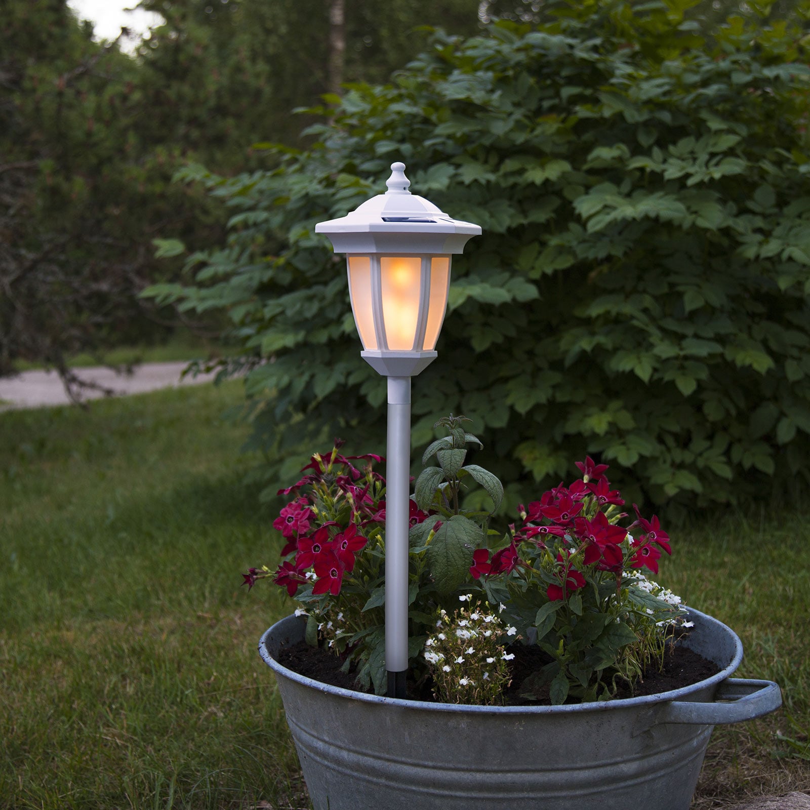 LED solcellelampe Flame 4-i-1 hvit plast IP44 bakside