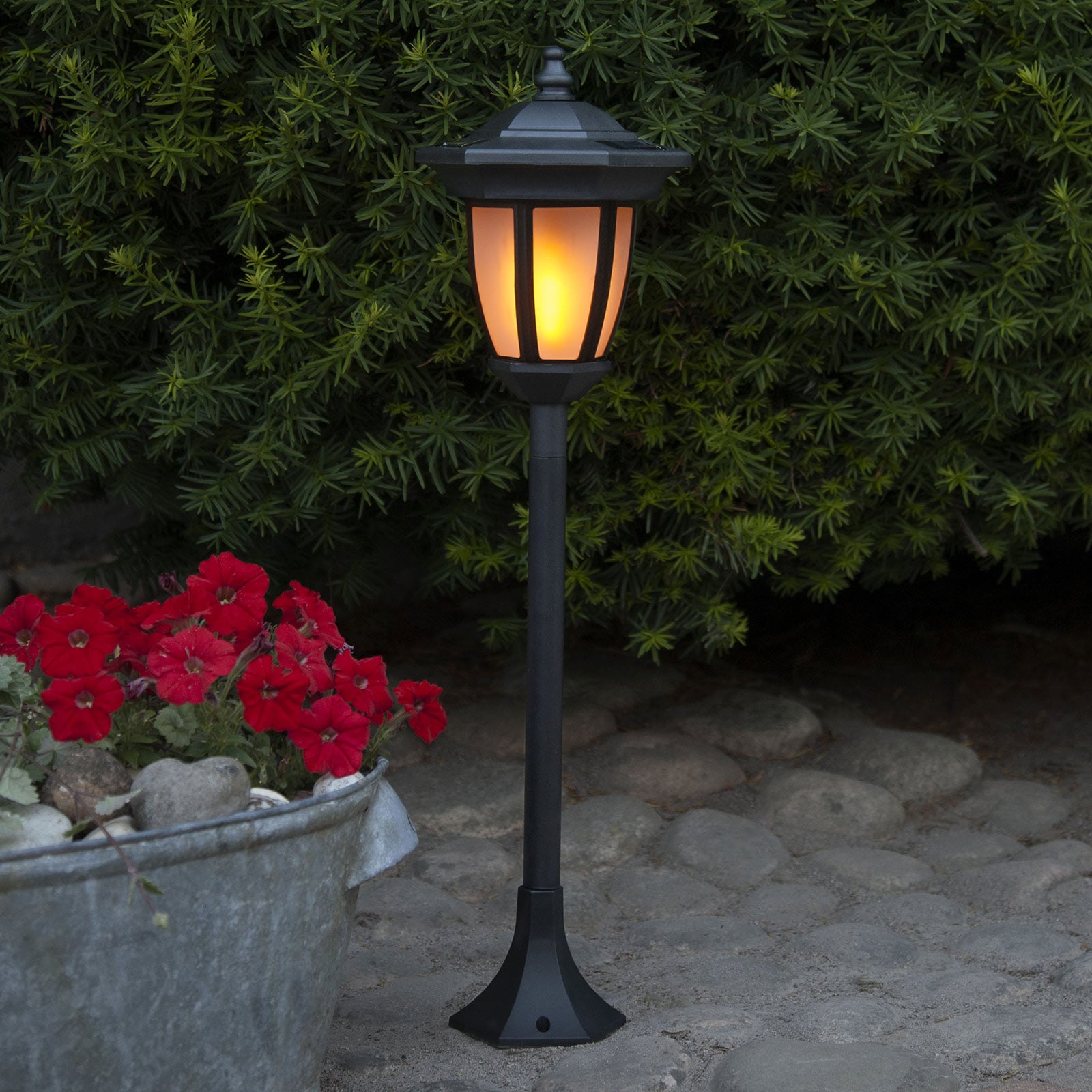 LED solcellelampe Flame 4-i-1 svart plast IP44 forfra