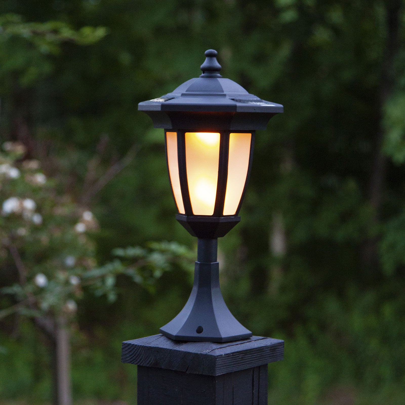 LED solcellelampe Flame 4-i-1 svart plast IP44 detalj av LED-lys