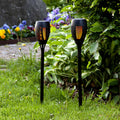 LED solcellelampe Flame med jordspyd 2-pk svart forfra