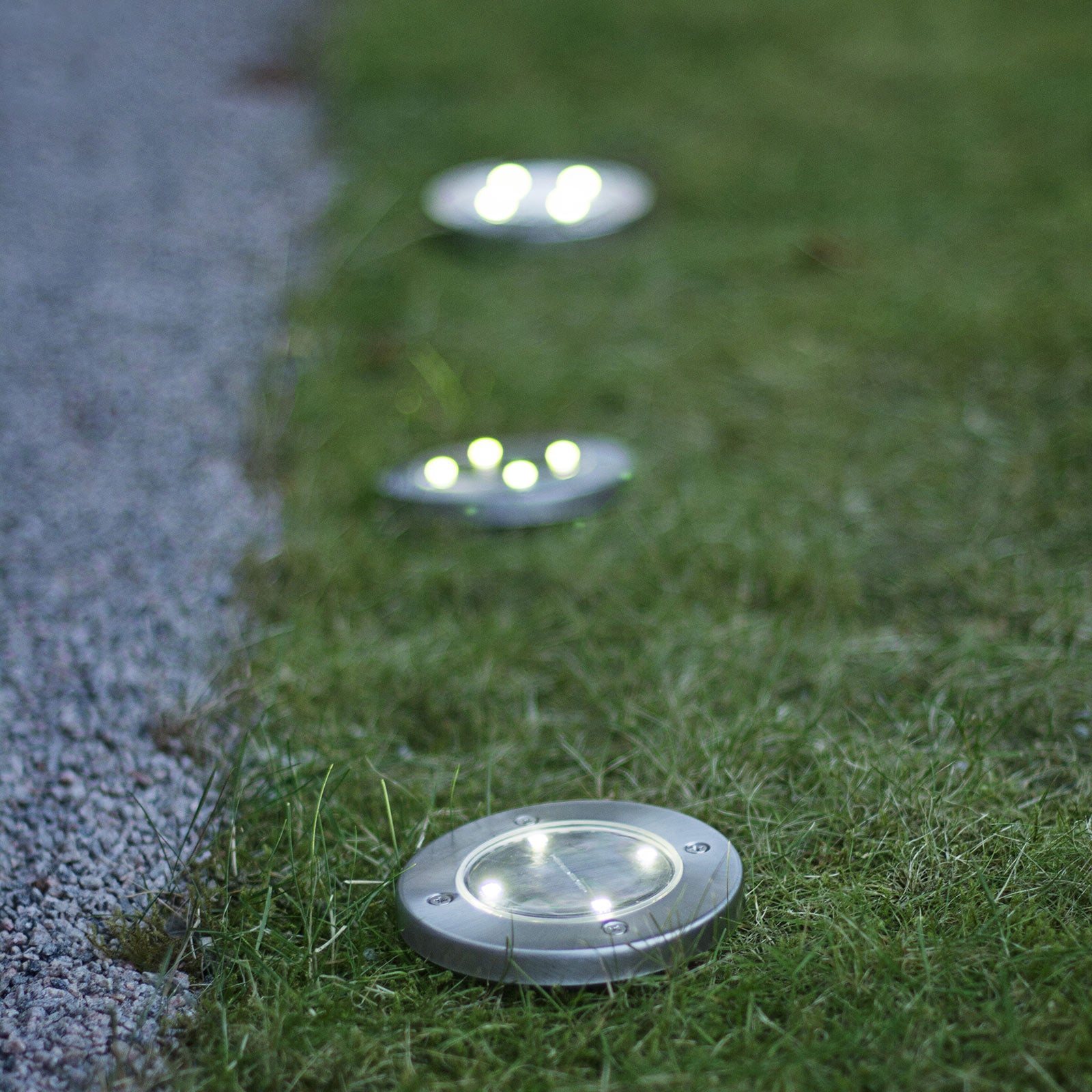 LED solcellelampe Lawnlight rustfritt stål IP44 3-pk montert i hage