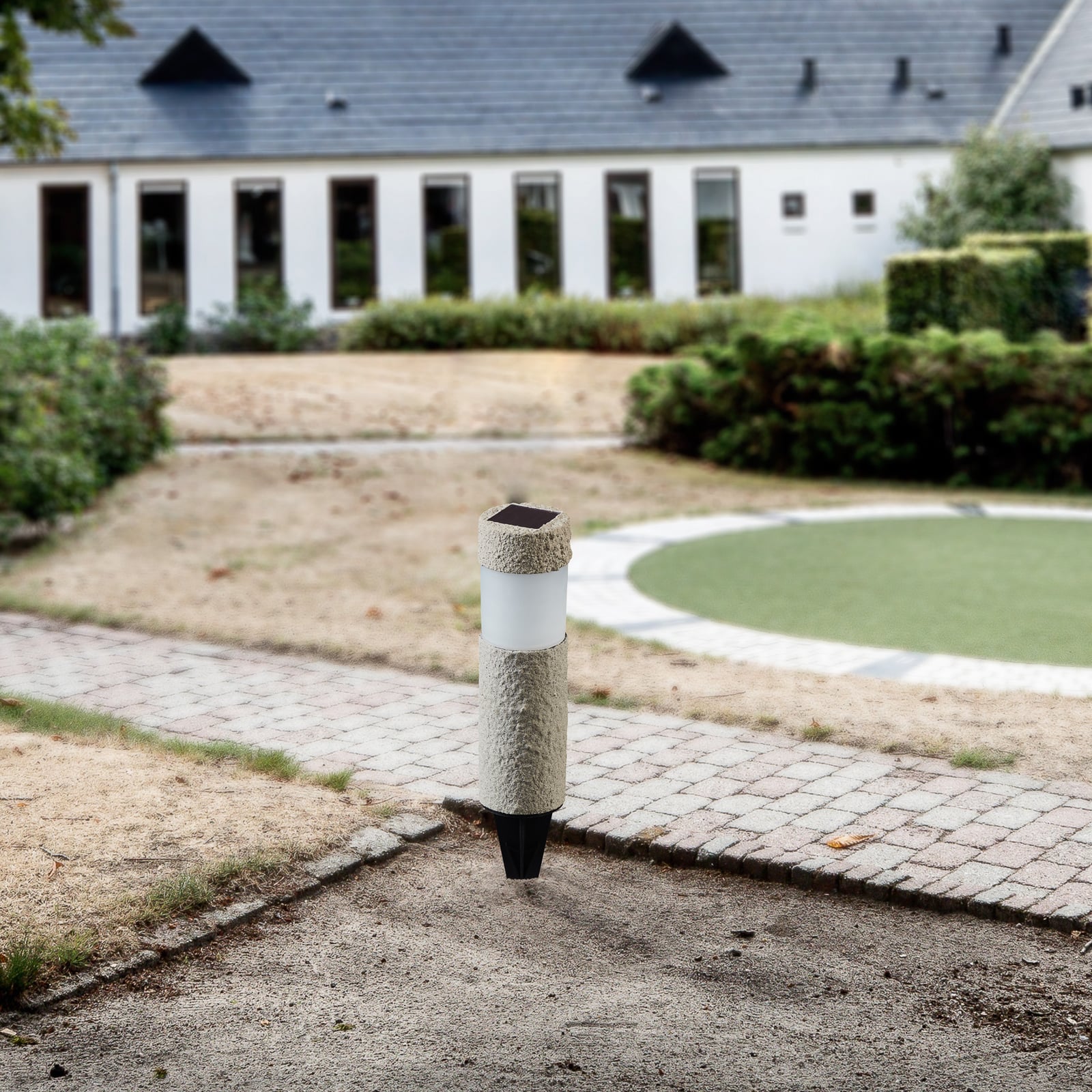 LED solcellelampe Mino med spyd steinoptikk grå detalj av spyd
