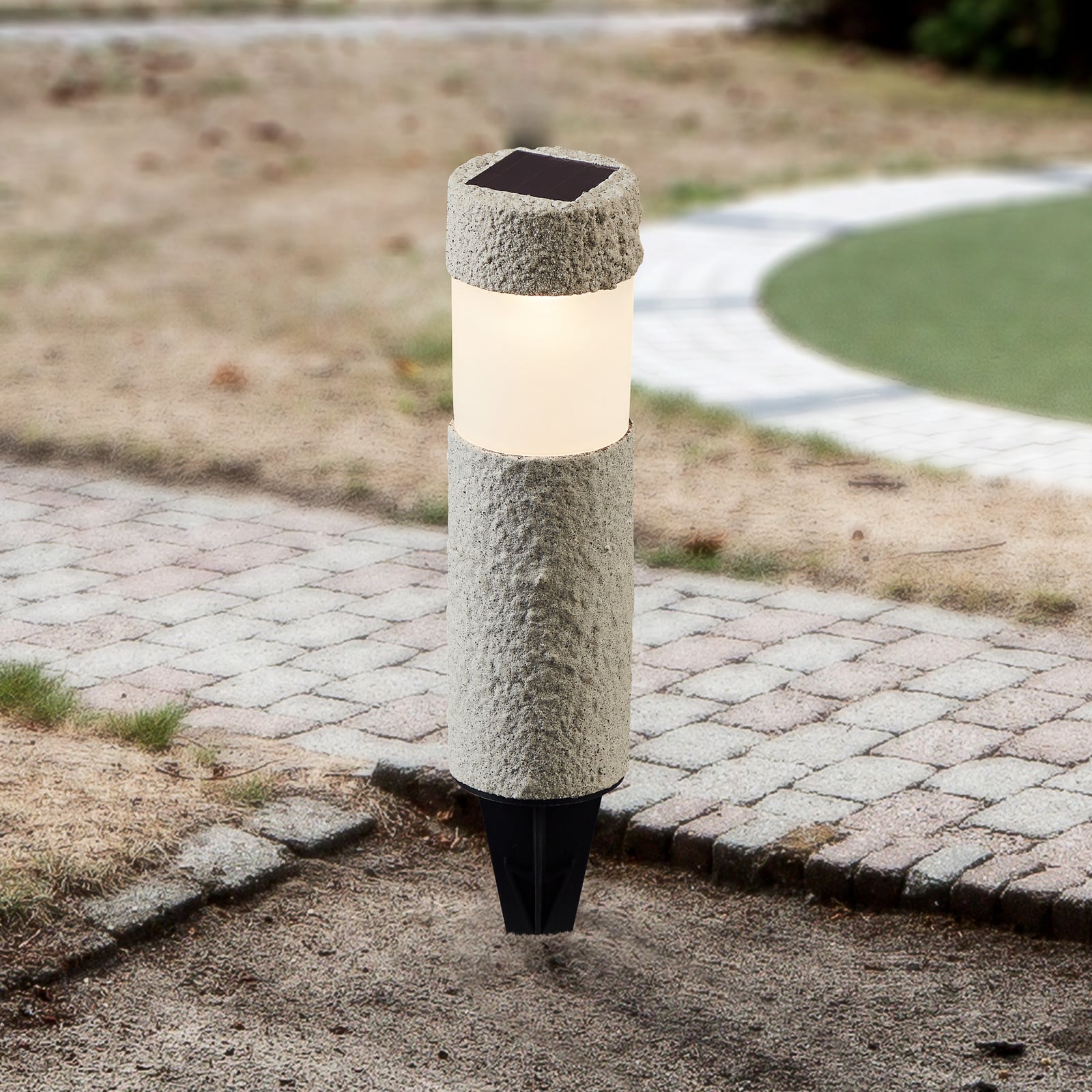 LED solcellelampe Mino med spyd steinoptikk grå sett forfra