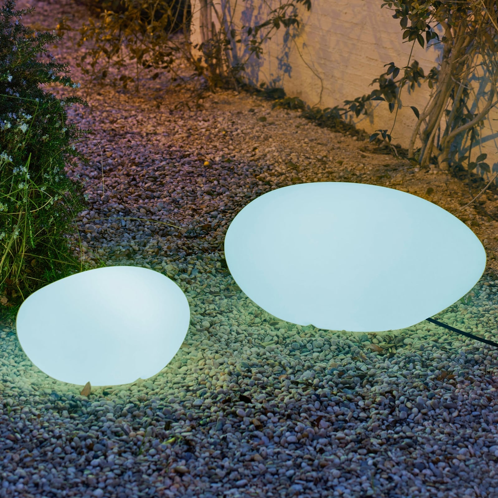 LED solcellelampe Petra steinform dimbar RGB IP65 60 cm bakside