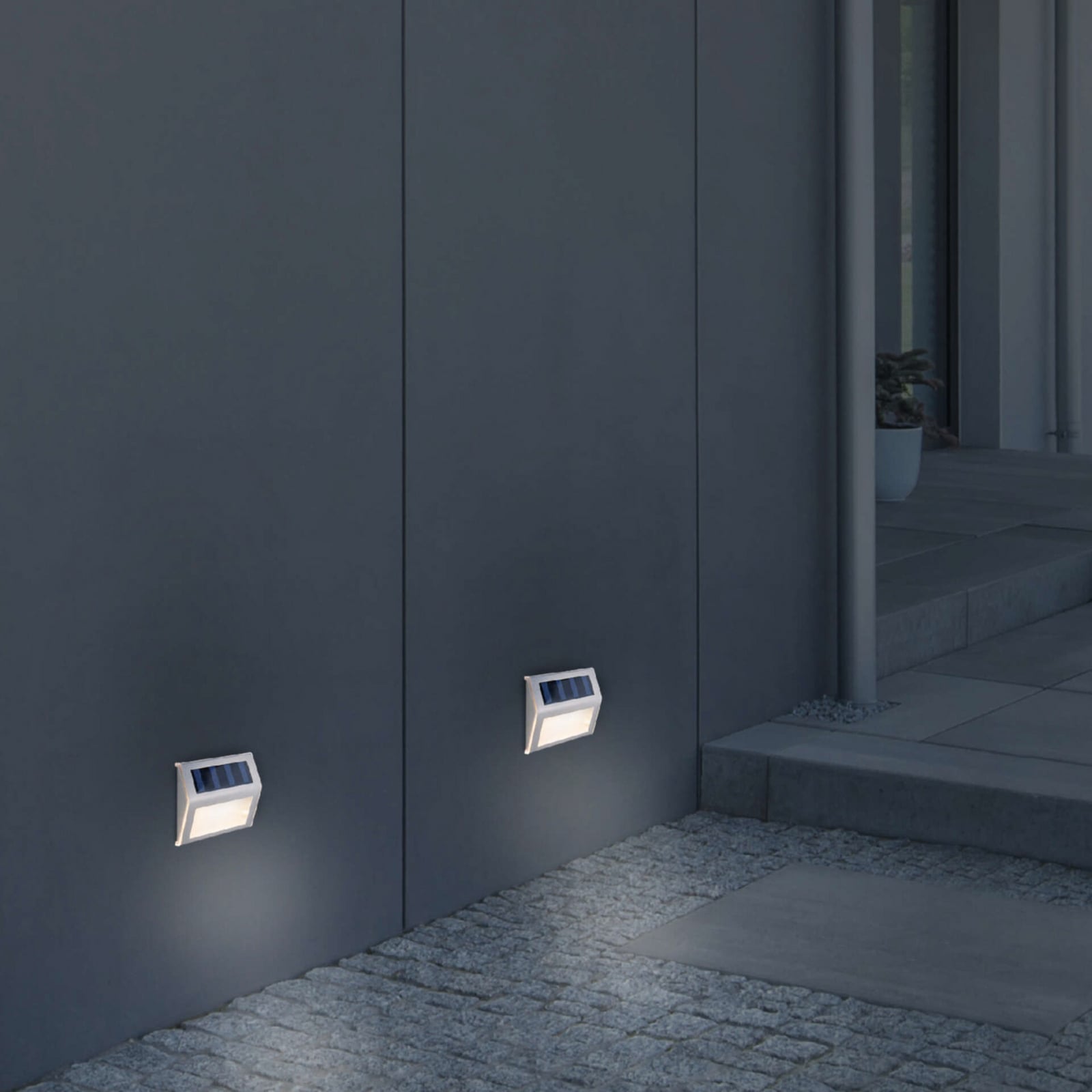 LED solcellevegglampe rustfritt stål 4-pack IP44 - Näve bakside