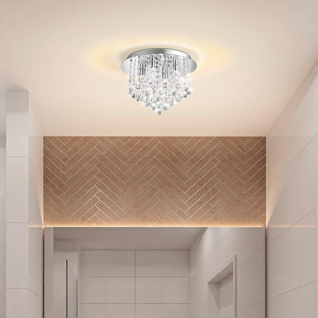LED taklampe Almonte krystallglass krom montert i rom