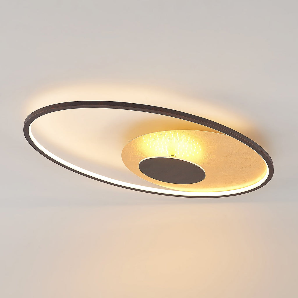 LED taklampe Feival dimbar rustfarget/gull montert i rom