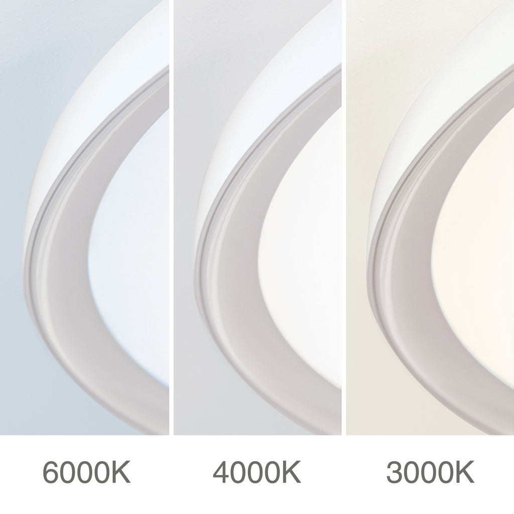 LED taklampe GAMMA Ø60 cm hvit CCT dimbar med fjernkontroll med fjernkontroll i bruk