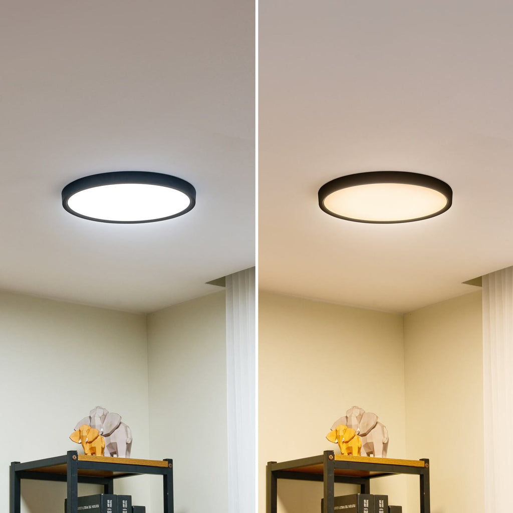LED taklampe Pravin CCT svart Ø30 cm i rom