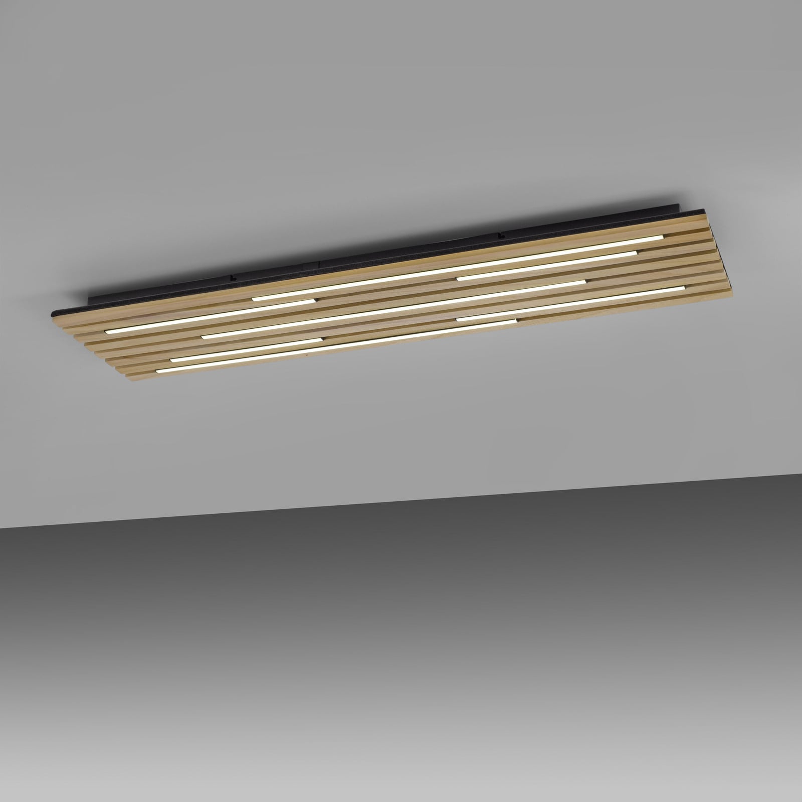 LED taklampe Q-Akustik tre/svart nærbilde av LED-lys