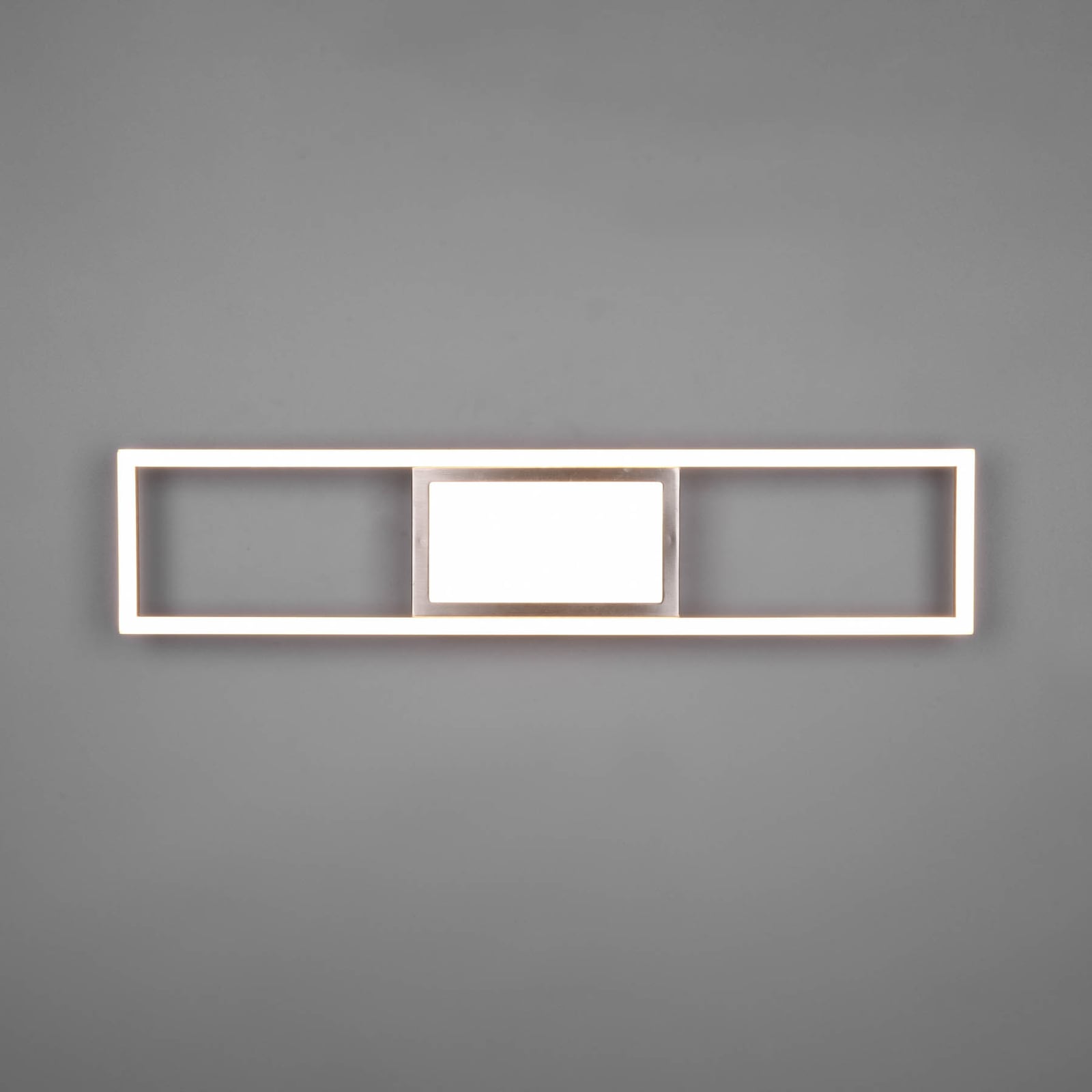 Nærbilde av fjernkontroll til LED taklampe Rigido dimbar CCT matt nikkel 60 cm