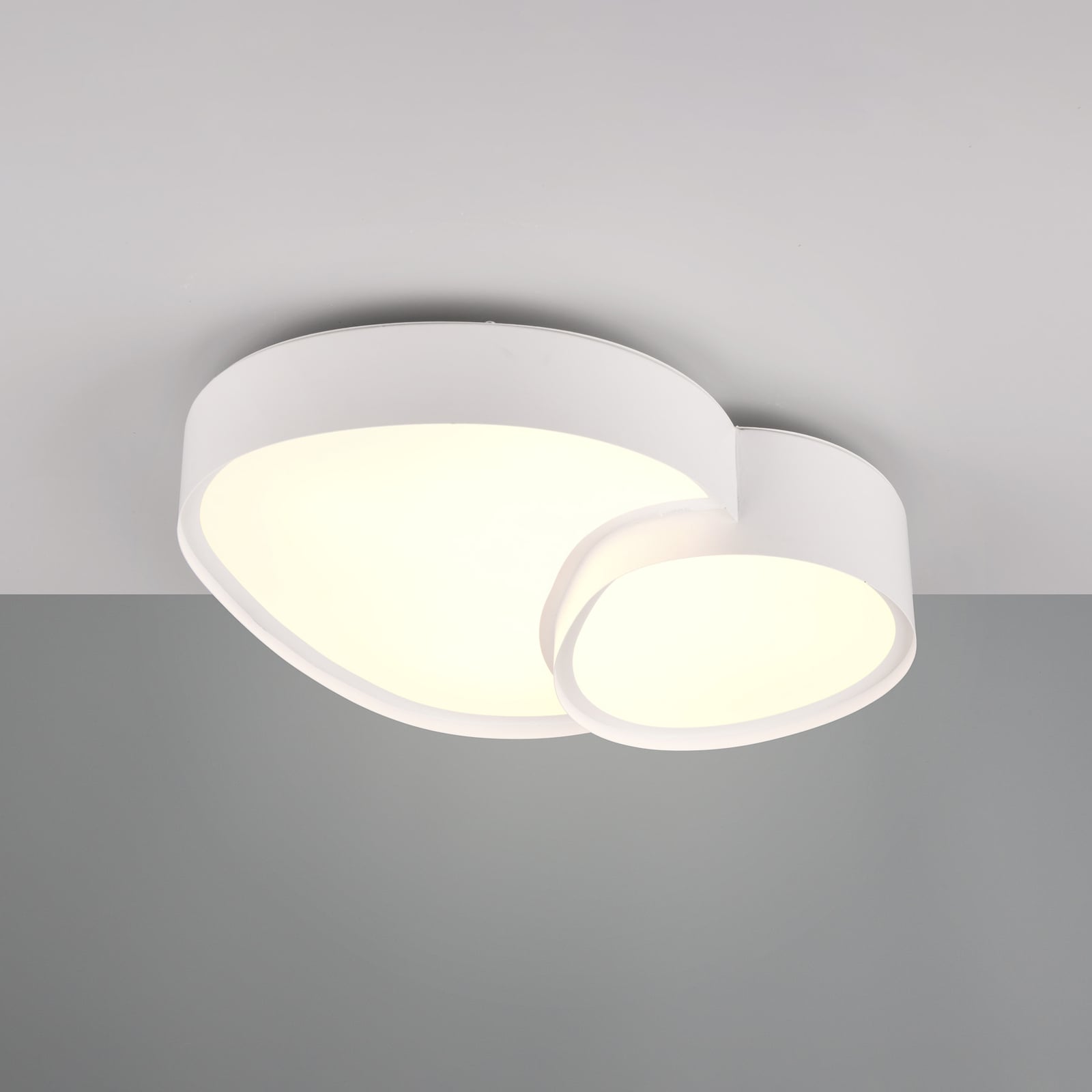 Nærbilde av LED taklampe Rise hvit CCT dimbar med fjernkontroll