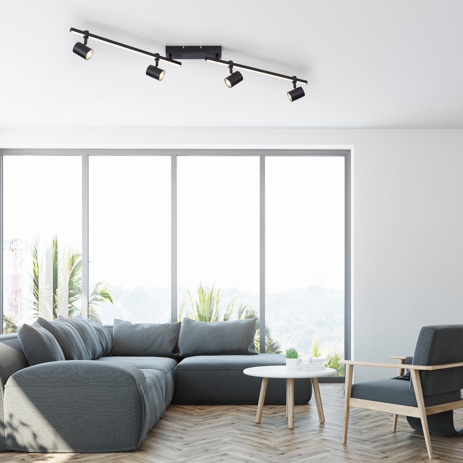 Detalj av justerbare spotter på LED takspot Barik 4-lys svart justerbar 120 cm