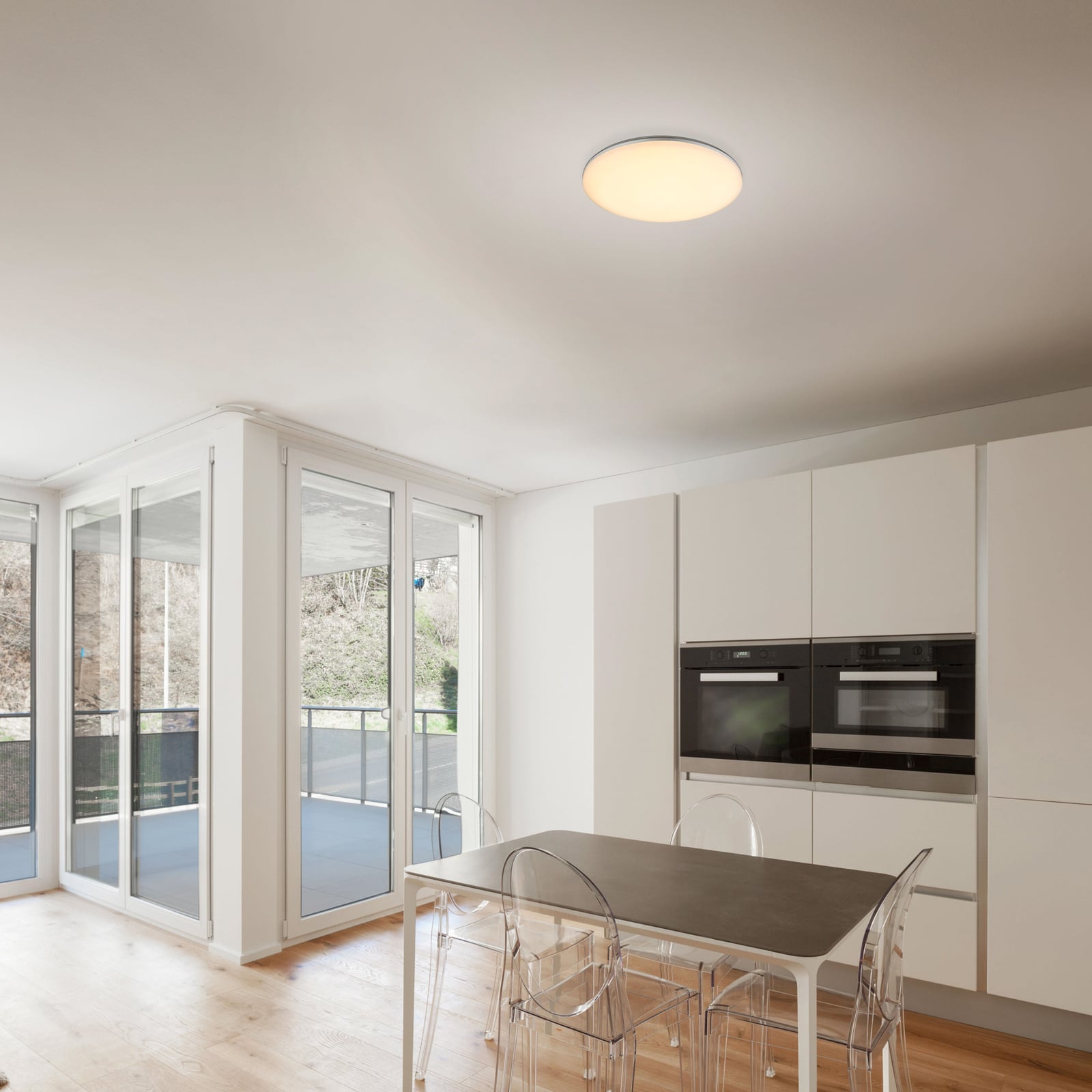 Bakside av LED utendørs taklampe Dori hvit plast Ø33 cm