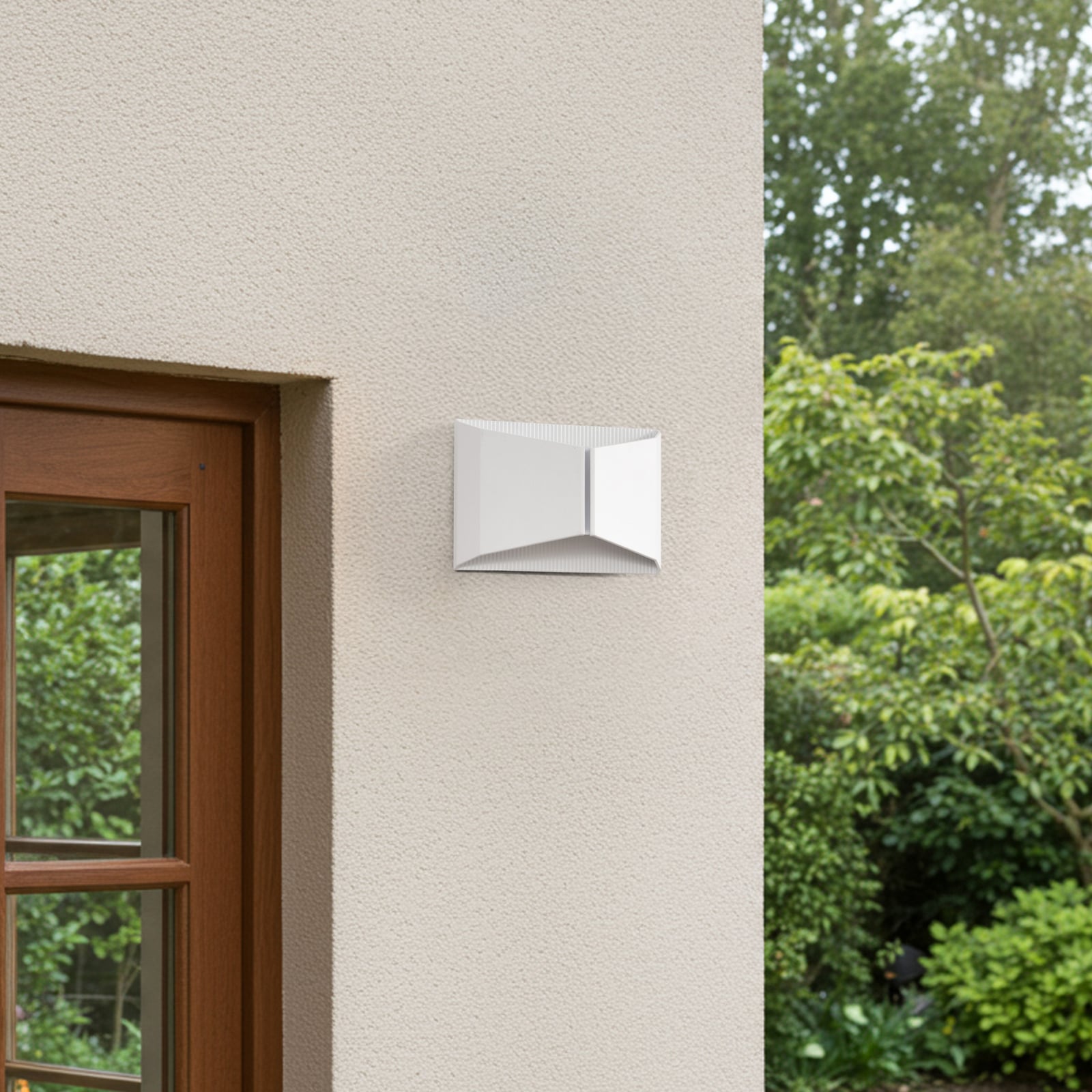 LED utevegglampe Anlira opp og ned hvit IP65 9W montert på vegg