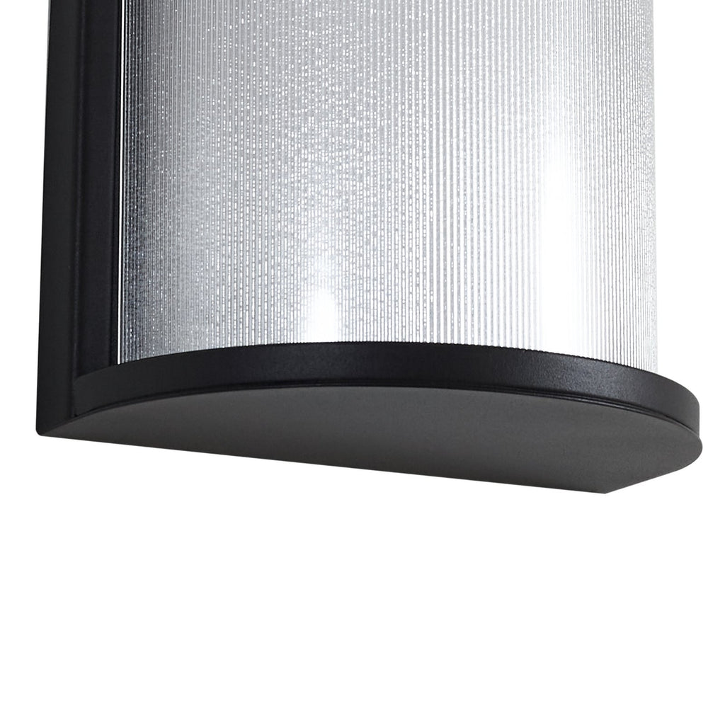 LED utevegglampe Calvik svart riflet rustfritt stål IP44 lys i bruk