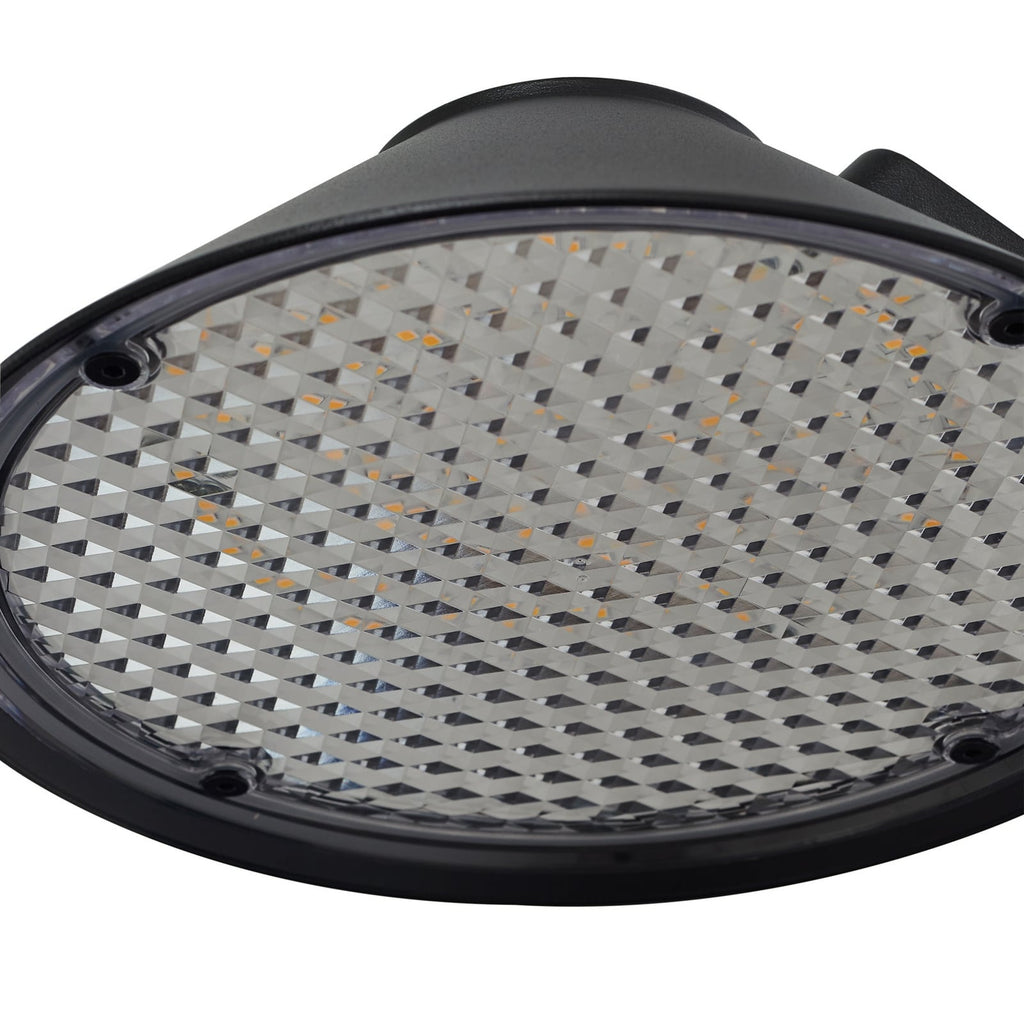 LED utevegglampe Capelo svart med bevegelsessensor i mørket