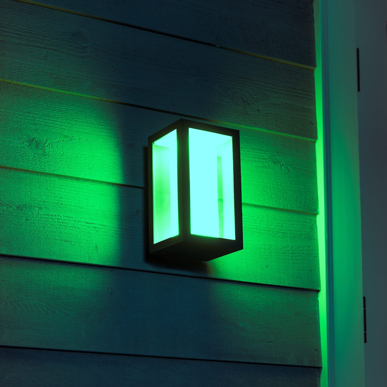 LED utevegglampe Impress RGBW svart IP44 16W Philips Hue montert på vegg