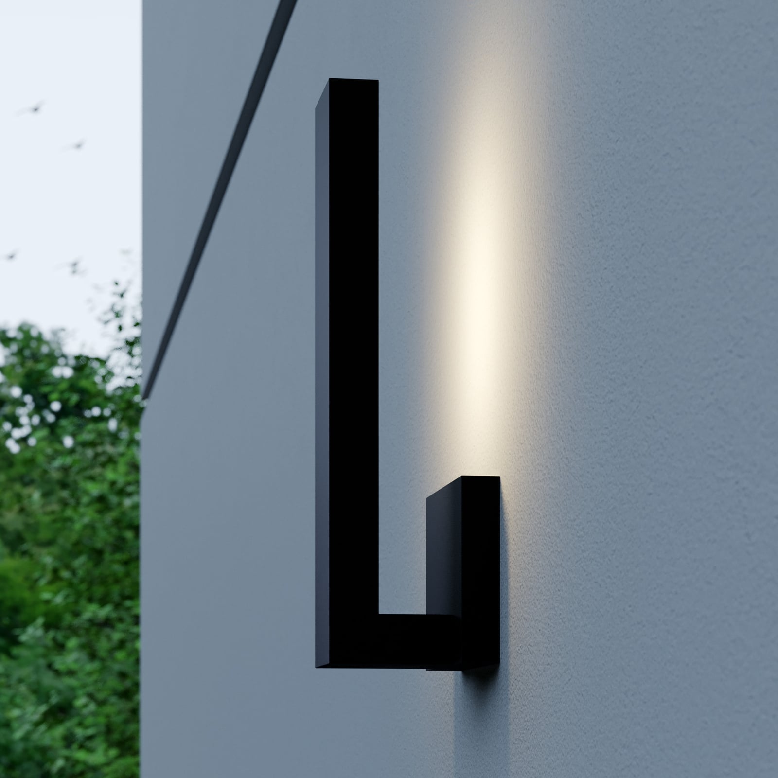LED utevegglampe Isadore svart indirekte lys i mørket