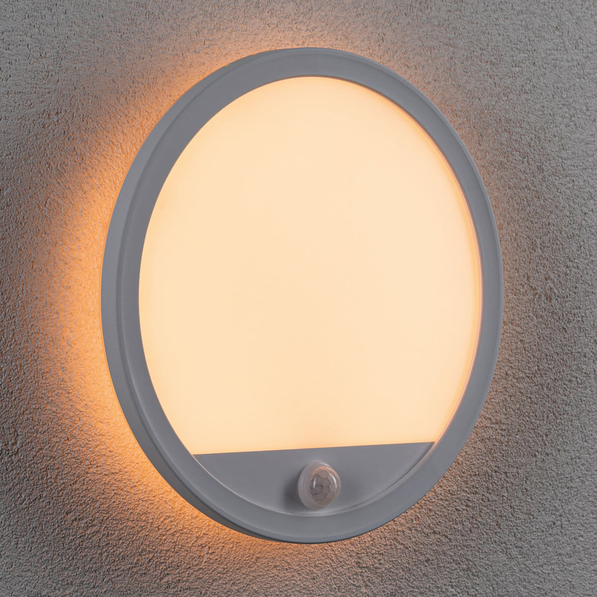 Montert LED utevegglampe Lamina rund CCT med bevegelsessensor hvit IP44