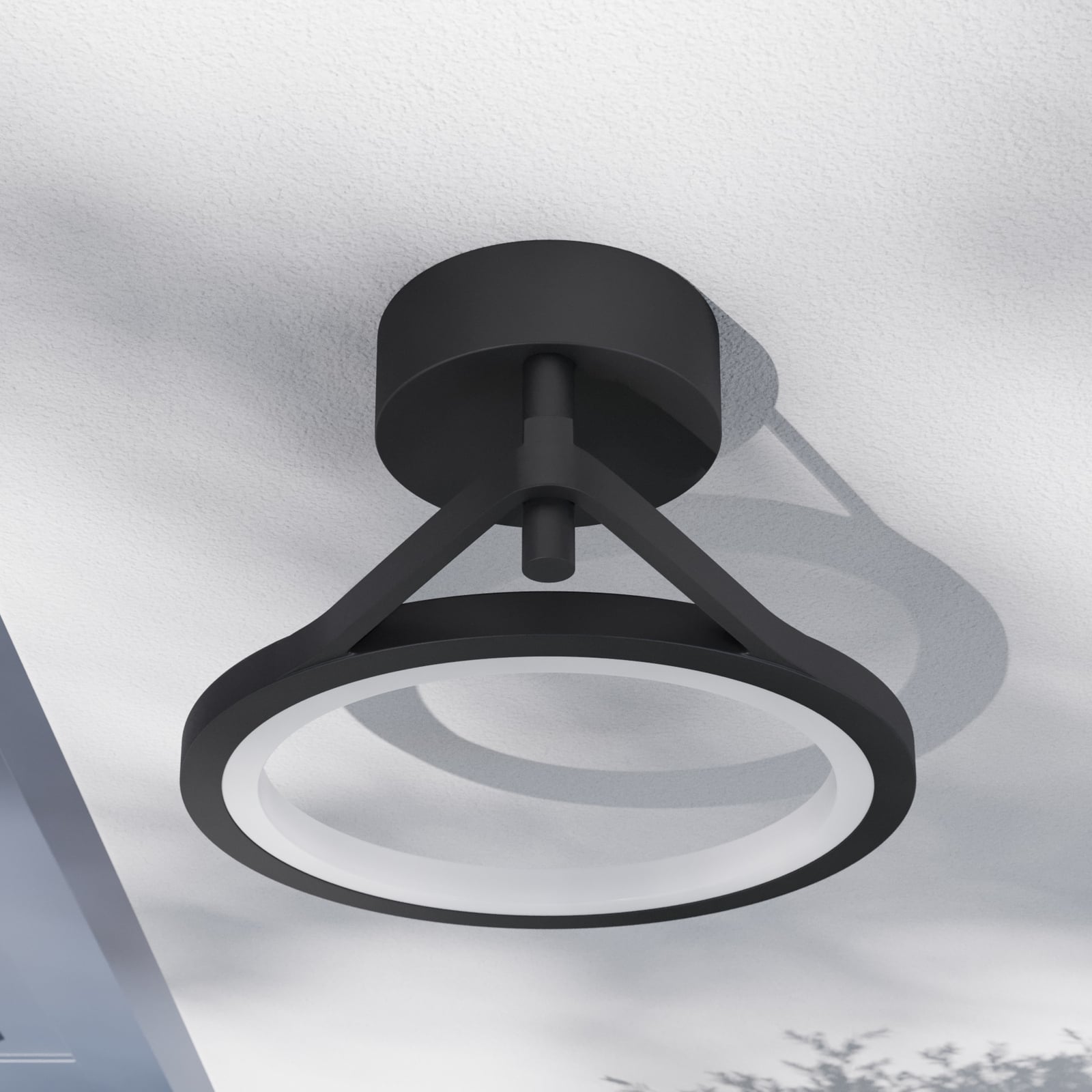 LED utevegglampe Mirco ringform 30 cm svart IP65 sammen med utendørsmøbler
