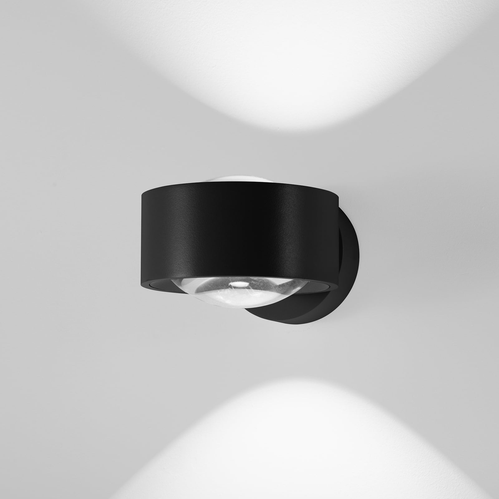 LED vegglampe Clippo Optic dimbar opp/ned svart Ø12 cm detalj