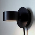 LED vegglampe Clyde dimbar svart med støpsel forfra