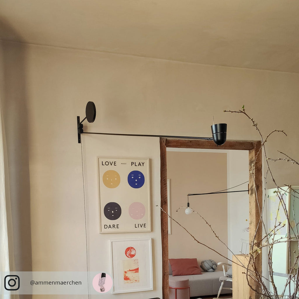 LED vegglampe Counterbalance svart aluminium nærbilde