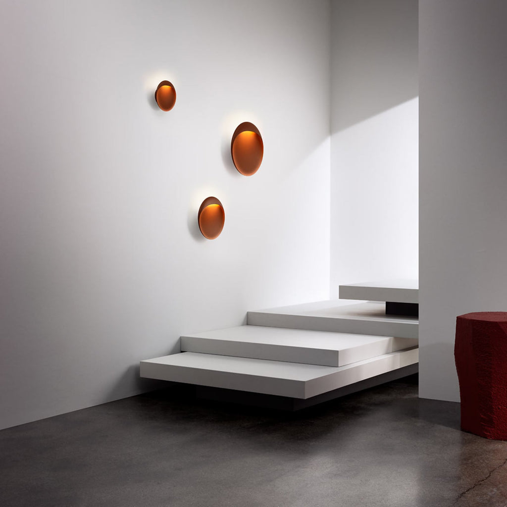 LED vegglampe Flindt dimbar corten Ø20 cm detalj av lysutslipp