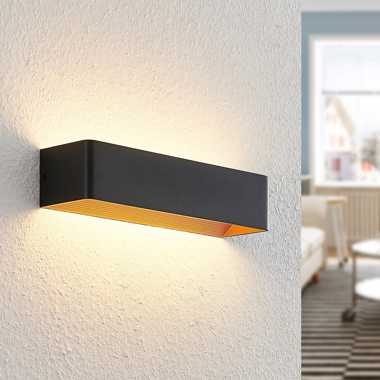 LED vegglampe Karam opp og ned svart/gull forfra