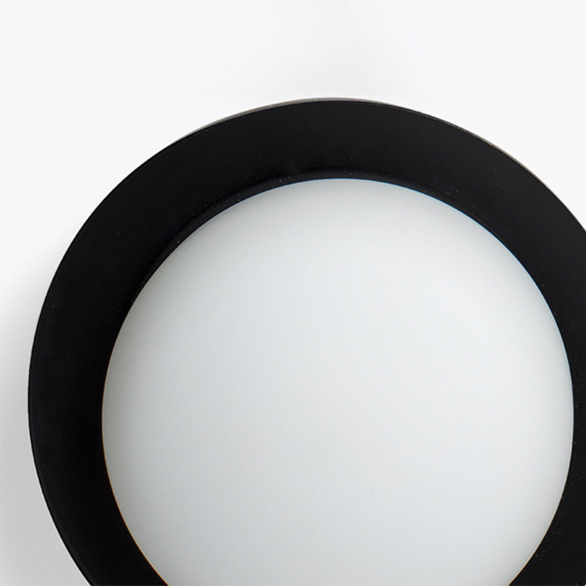 Nærbilde av LED vegglampe May Ø12 cm stål og glass svart IP44