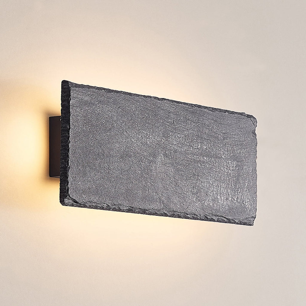 LED vegglampe Peetu skiferstein dimbar nærbilde av LED-lys