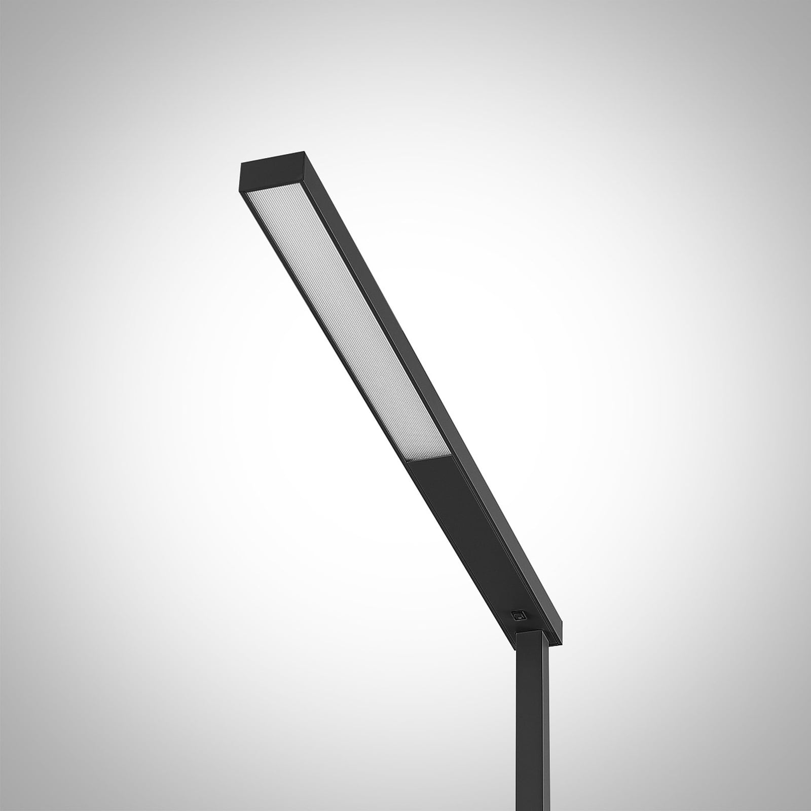 Nærbilde av LED gulvlampe Tamilo svart opp-og-ned-lys bryter