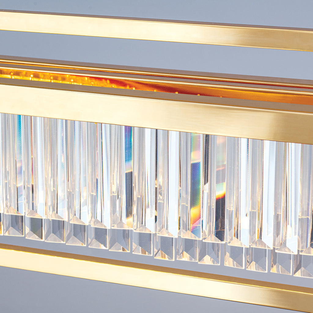 Nærbilde av LED-lys i pendellampe Prism krystallglass gull