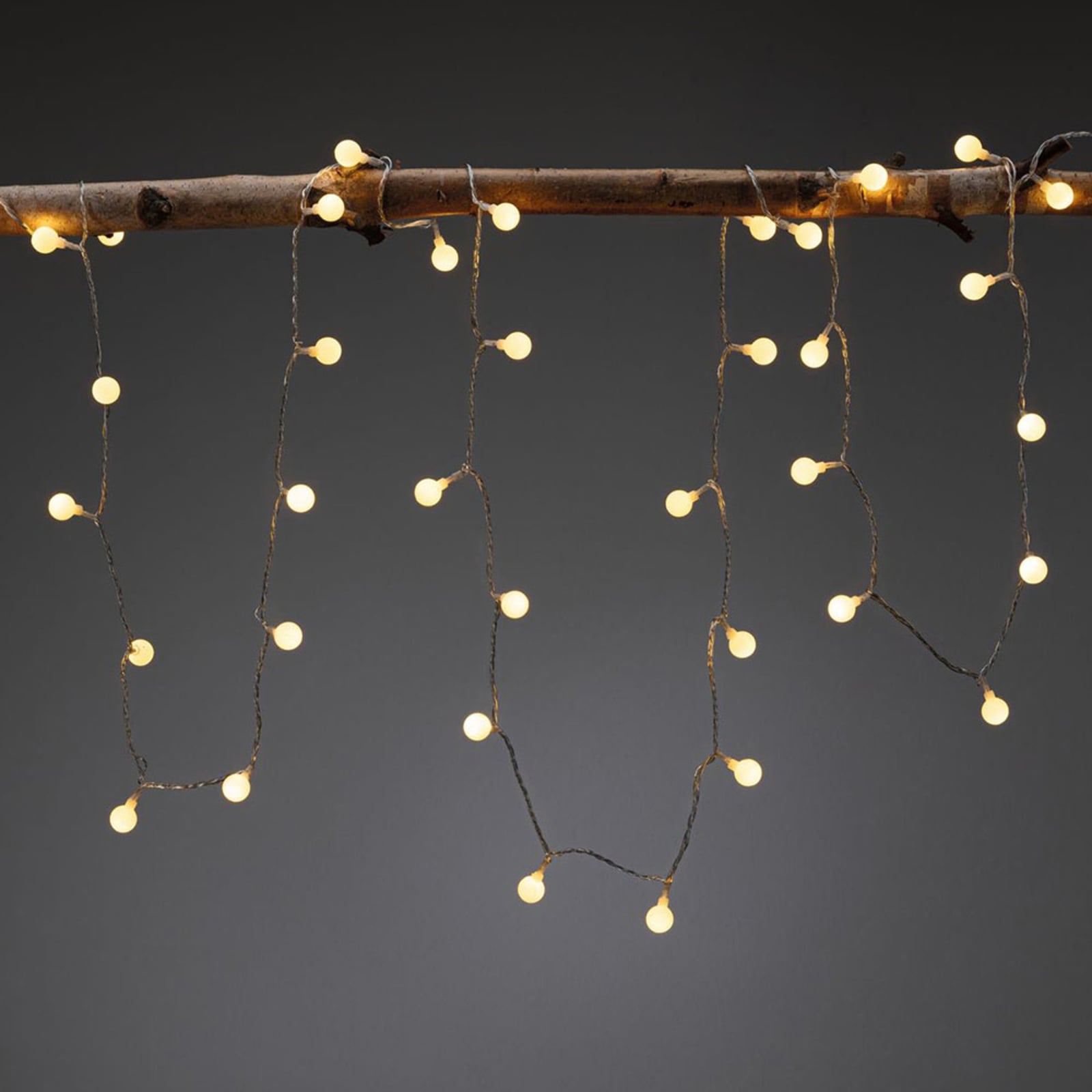 Bakside av Plug & Shine LED lyslenke mini 5 m varmhvit IP44