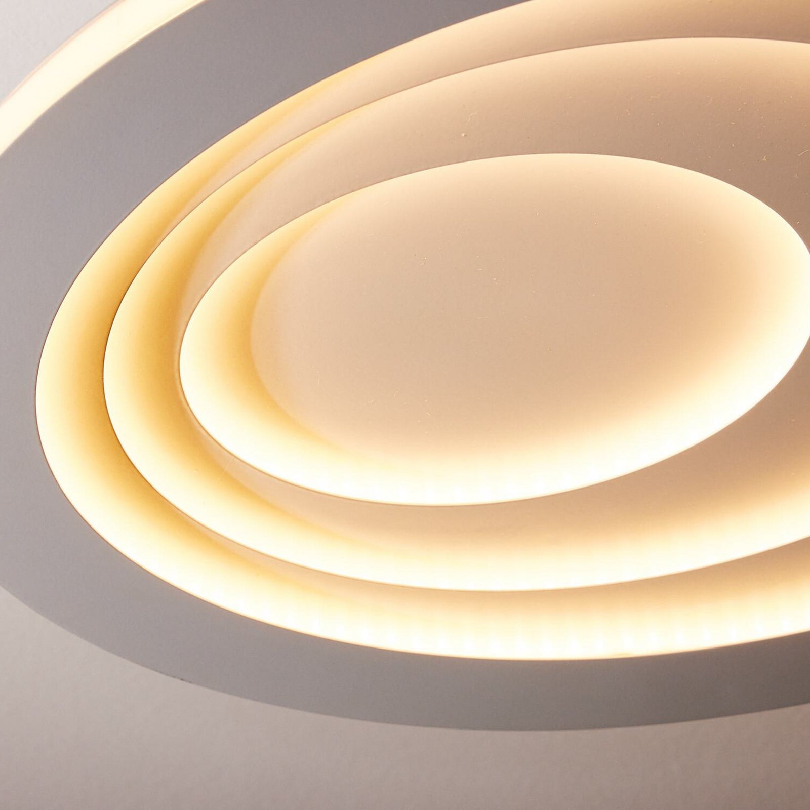 Sidevisning av LED taklampe ORBIS SPIRAL oval hvit