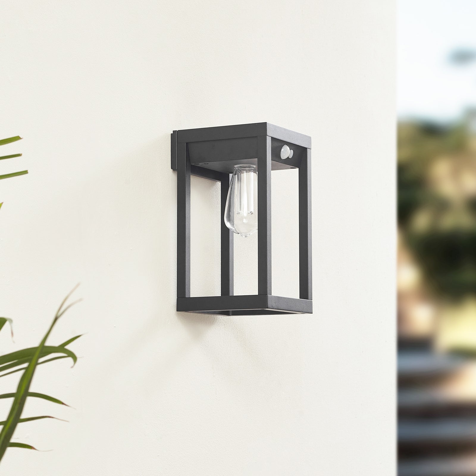 Smart LED solcellevegglampe Enea bakside og solarpanel