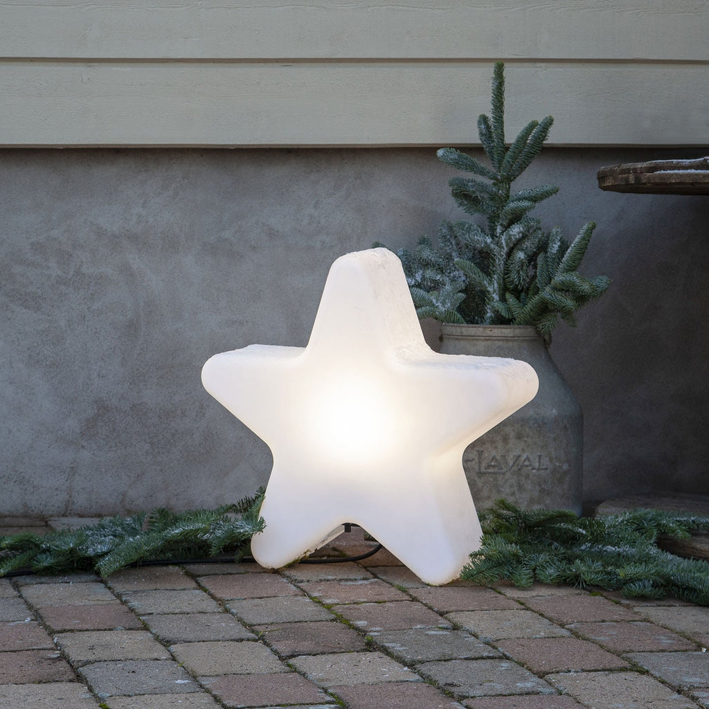 Detalj av terrasselampe stjerneformet hvit plast 50 cm IP65 STAR TRADING
